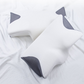Memory foam cervical pillow available in black, white, and grey