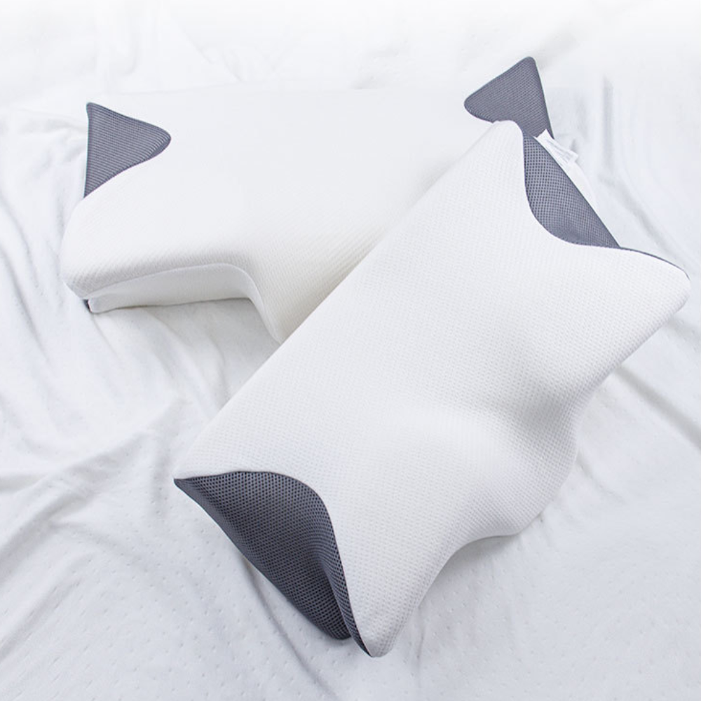 Memory foam cervical pillow available in black, white, and grey
